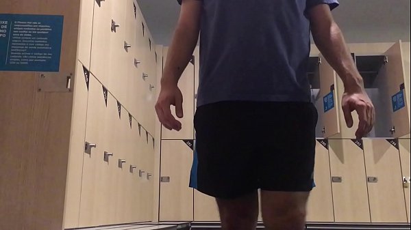 Amateur changing at the gym locker room (post workout)