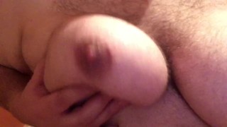 Chubby playing with big tits