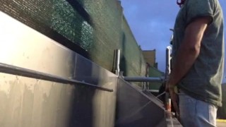 Handsome guys spied pissing at urinal