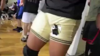 college wrestler adjusting bulge