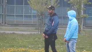 Zooming in on 2 Men Taking a Public Piss in Front of Many in the Quad.