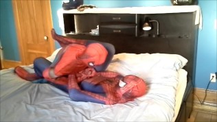 spiderman plays with his dummy spiderman