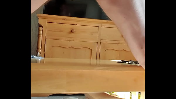 Berty in chastity cage dildoes his arse