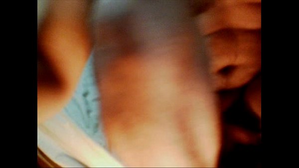 Bisexual young guy playing with banana